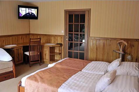 Trojka Hotel Es Panzio Solnok Oda fotoğraf